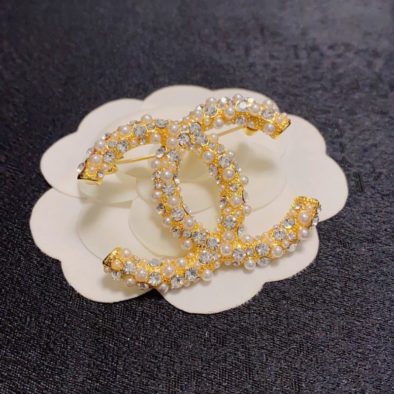 Ch**el brooches